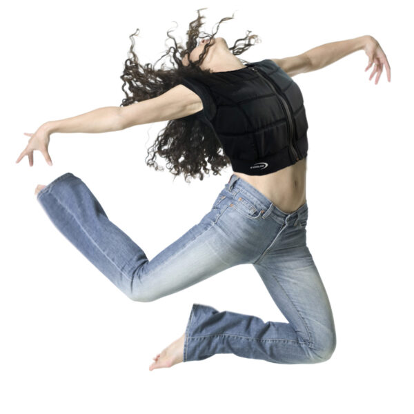 Woman wears black cooling vest from E.COOLINE and jumps acrobatically into the air